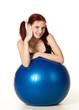 Woman with gymnastic ball