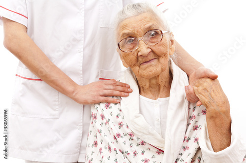 Photo: young doctor's helping hand for the elder ones young doctor's helping hand for the elder ones