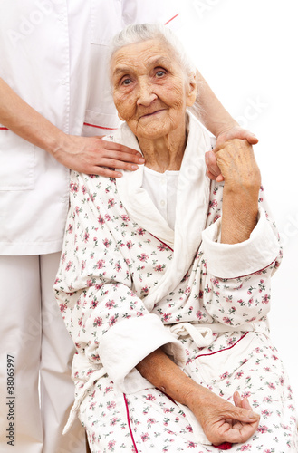 Photo: young doctor's helping hand for the elder ones young doctor's helping hand for the elder ones