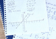 Math, physics and geometry on copybook page closeup