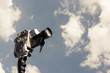 vintage 8mm camera with a cloudy background