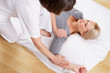 Foto: Woman having Shiatsu massage Woman having Shiatsu massage