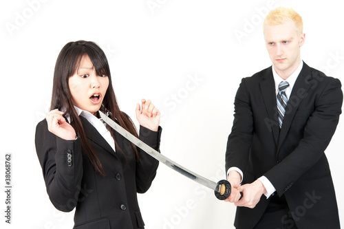 Photo: business team fighting business team fighting