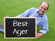 Best Ager - Happy Senior with Chalkboard Best Ager - Happy Senior with Chalkboard