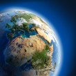 Earth with high relief, illuminated by the sun Earth with high relief, illuminated by the sun