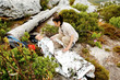 Hiker covered with emergency blanket