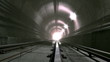 Ride through old looking rail tunnel to the bright light