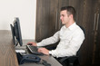 Male worker at a helpdesk
