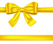 Golden ribbons with bow on white Golden ribbons with bow on white