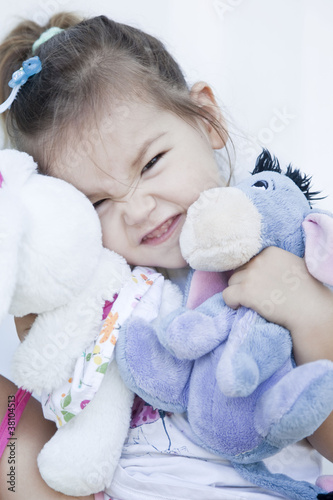 Photo: Girl with toy Girl with toy