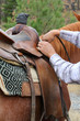 Photo: Adjusting saddle Adjusting saddle