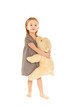 Little girl with toy standing