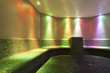 Photo: colored lights in a steam bath with long tiled bench colored lights in a steam bath with long tiled bench