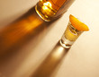 Tequila shot with orange and bottle