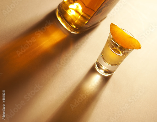 Photo: Tequila shot with orange and bottle Tequila shot with orange and bottle