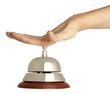 Hand of a woman using a hotel bell  isolated