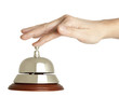 Hand of a woman using a hotel bell  isolated