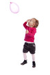 little girl playing with a balloon