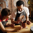 Teacher and student potters