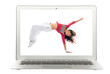 Photo: Modern popular laptop with woman dancing dancer Modern popular laptop with woman dancing dancer