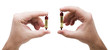 shock absorbers from the toy car in hands on white background