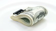 Bundle of many 100 dollar notes rotating on white background Bundle of many 100 dollar notes rotating on white background