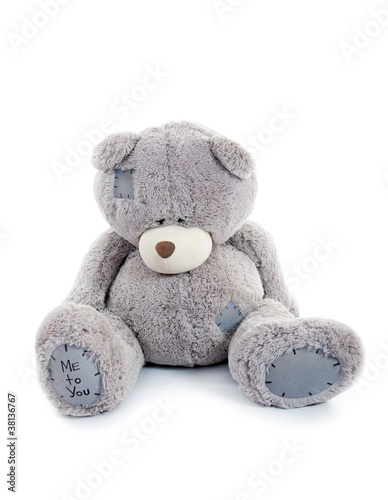 Photo: sad teddy bear. isolated sad teddy bear. isolated