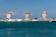 Medieval windmills at Mandraki Harbour in  Rhodes,