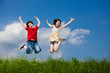 Girl and boy running, jumping outdoor