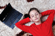 happy school girl relaxing at home