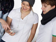 Young friends having fun with their mobile phone