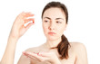 Beautiful woman looking doubtly on the cure