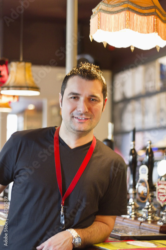 Photo: Portrait of smiling pub manager Portrait of smiling pub manager