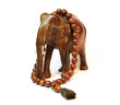 A wooden elephant and wooden beeds