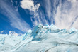 Climbers walk up on glacier in Patagonia.