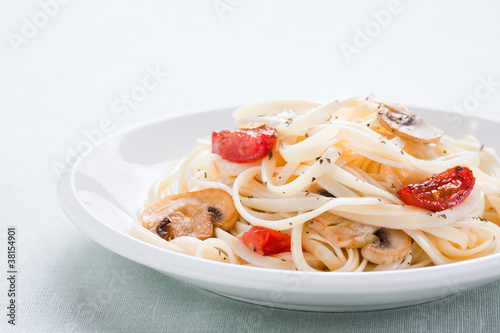 Photo: Tagliatelle sautéed with tomatoes and mushrooms Tagliatelle sautéed with tomatoes and mushrooms