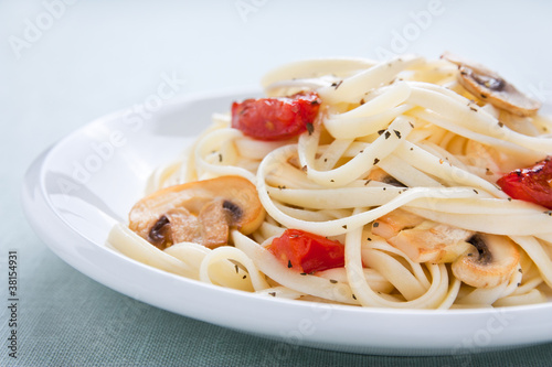 Photo: Tagliatelle sautéed with tomatoes and mushrooms Tagliatelle sautéed with tomatoes and mushrooms