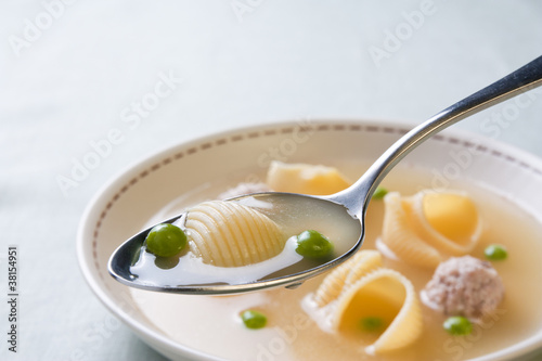 Photo: Catalan cuisine. Spoon of soup with meat of the pot Catalan cuisine. Spoon of soup with meat of the pot