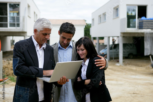 Photo: Couple buying their first home Couple buying their first home