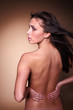 Woman with back pain holding lower back