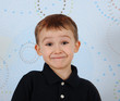 closeup of sweet little boy making a cute smile
