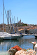 Port of Marseille in France with fishing nets in the foreground