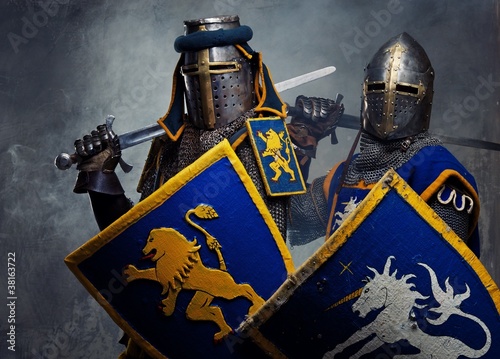 Photo: Medieval knights on grey background. Medieval knights on grey background.