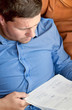 Businessman analyzing a sheet