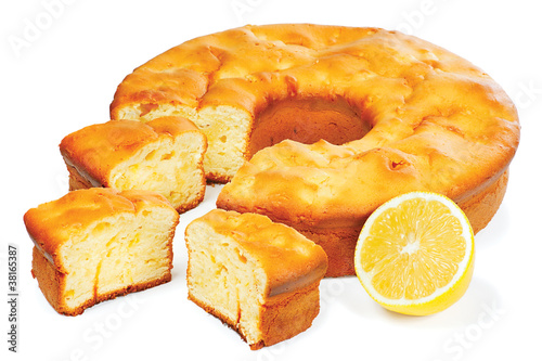 Photo: Traditional festive lemon cake on a white background Traditional festive lemon cake on a white background