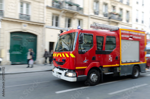Photo: Fire truck in the street of Paris, France Fire truck in the street of Paris, France
