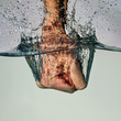 Photo: Angry Fist Punching Water Angry Fist Punching Water
