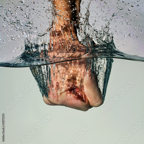 Photo: Angry Fist Punching Water Angry Fist Punching Water