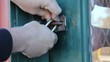 Locking And Shaking A Padlock On Metal Door Locking And Shaking A Padlock On Metal Door