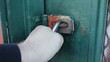 Shaking A Padlock With The Left Hand Shaking A Padlock With The Left Hand
